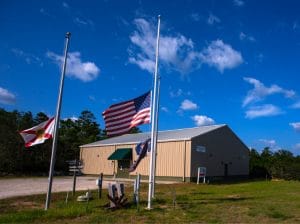 Camp Gordon Johnston WWII Museum in Carrabelle FL with flags at half-staff in honor of 9:11