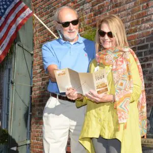 Couple reading walking tour map downtown Apalachicola Florida