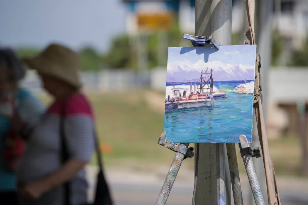 Artists working on painting of Apalachicola FL